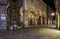 Medieval narrow cozy street via di Citta with Loggia della Mercanzia in Siena