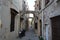 Medieval narrow streets and old ruined houses in old Rhodes town, Greece