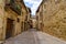 Medieval old town with stone houses, old doors and windows, cobbled streets and picturesque atmosphere. Pedraza, Segovia, Spain