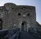 Medieval ottoman fortress near Srebrenik on steep rock with tower-gate, round tower and wooden bridge over the moat