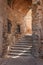 Medieval passageway with stairs in the ancient city of Caceres in Spain