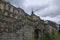 Medieval Pidhirtsi Castle at cloudy summer day, several minutes before rain. Village Pidhirtsi, Lviv region, Ukraine