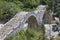 Medieval Plakidas Bridge at Pindus Mountains, Greece