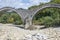 Medieval Plakidas Bridge at Pindus Mountains, Greece