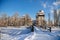 Medieval renaissance water castle with half-timbered tower with snow in winter sunny day, Historic Romantic chateau Blatna near