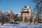 Medieval renaissance water castle with half-timbered tower with snow in winter sunny day, Historic Romantic chateau Blatna near