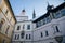 Medieval renaissance water castle with half-timbered tower with snow in winter sunny day, Historic Romantic chateau Blatna near