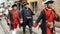 Medieval soldiers marching on the street