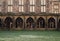 Medieval stone cathedral cloisters.  Exterior facade view.  Durham Cathedral World Heritage Site