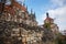 Medieval stone St. BartholomewÂ´s Church in Kolin, Gothic Cathedral and baroque building of Ossuary in autumn day, arched windows