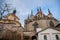 Medieval stone St. BartholomewÂ´s Church in Kolin, Gothic Cathedral and baroque building of Ossuary in autumn day, arched windows