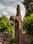 Medieval stone statue over an old well, Alsace, territory of Andlau Abbey