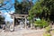 Medieval stone Torii gate in shinto temple, Bikan district, Kurashiki city, Japan