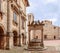 The medieval stone well Pozzo dei Grifi e dei Leoni with griffins and lions on the central Piazza Grande in Montepulciano,