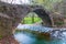 Medieval stony bridge over the small river