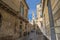 Medieval street and historical house in Lecce, Italy