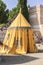 medieval tent of different colors with coats of arms and blazons