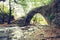 Medieval Venetian bridge in the sun rays