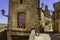 Medieval village with stone houses, cobblestone streets, old doors and windows, arches and walls. Maderuelo Segovia Spain. Europe