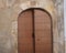 Medieval voussoir doorway made of brown stone, Cabaces, Catalonia, Spain, Europe