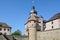 Medieval wall at the Marienberg castle with a bridge in Wuerzburg with blue sky