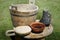 Medieval ware: wooden tub and ladle with flour, ceramic pitcher and bowl.