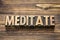 Meditate word in wood type