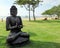 Meditating Buddha statue on Nusa Dua beach in Bali Indonesia