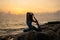 The meditating girl on a stone