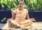 A meditating senior Indian woman