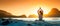 Meditating woman by the ocean with rocks