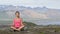 Meditating yoga woman in meditation in nature