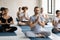 Meditation enlightenment practice with teacher during yoga class