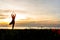 Meditation yoga lifestyle woman silhouette on the Sea sunset, relax vital