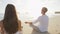 Meditation and Yoga people meditating on beach