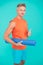 Meditations designed to help you find your joy. Man practicing yoga at home. Handsome sportsman with yoga mat. Workouts