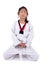 Meditative Asian girl in the Taekwondo school