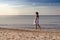 Meditative beautiful woman on a tropical beach