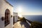 mediteranean house with stunning view of the coastline and the warm sun shining