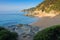 Mediterranean beach in Lloret de Mar. Spanish wonderful beach. Cala de Boadella platja. Beach landscape on sea