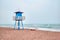 Mediterranean beach with vintage lifeguard tower