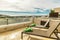 Mediterranean coastline from luxury apartment terrace loungers