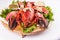 Mediterranean cuisine, lobster stuffed with cabbage, greens and sauces