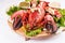 Mediterranean cuisine, lobster stuffed with cabbage, greens and sauces