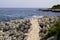 Mediterranean customs path along the water patway to rock beach coast Juan-les-Pins in Antibes France