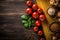 Mediterranean flavors, pasta, tomatoes on rustic background top view, border