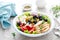 Mediterranean Greek and chickpea salad with fresh vegetables and feta cheese