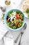 Mediterranean Greek and chickpea salad with fresh vegetables and feta cheese