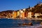 Mediterranean hillside city in France with harbor