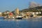 Mediterranean port scene, early morning light.